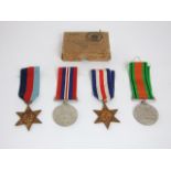 A 39-45 War medal, Defence Medal, France & Germany, 39-45 Star with original postal packaging (Mr