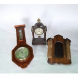 An inlaid Edwardian mahogany aneroid barometer, a small portico clock with eight day striking