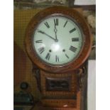 A late 19th century American walnut and straw marquetry inlaid drop dial wall clock, the 30 cm