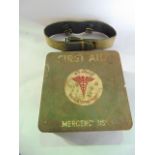 A WWII period US Army medical department emergency first aid kit, with partial contents together