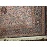 A small Wilton type carpet, the central kite shaped medallion with intricate floral decoration set