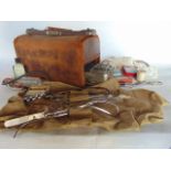 An antique Gladstone type box/medicinal case together with a quantity surgical apparatus and other