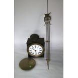 A 19th century French wall clock with 30 hour striking movement and convex enamelled dial, the