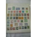 An album containing a collection of British, Commonwealth and world stamps including China, France