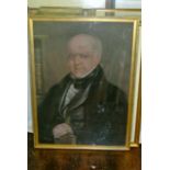 A 19th century pastel portrait/half length study of a gentleman wearing a signet ring and holding