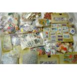 Five boxes containing a very large quantity of British and world stamps, covers, albums, album