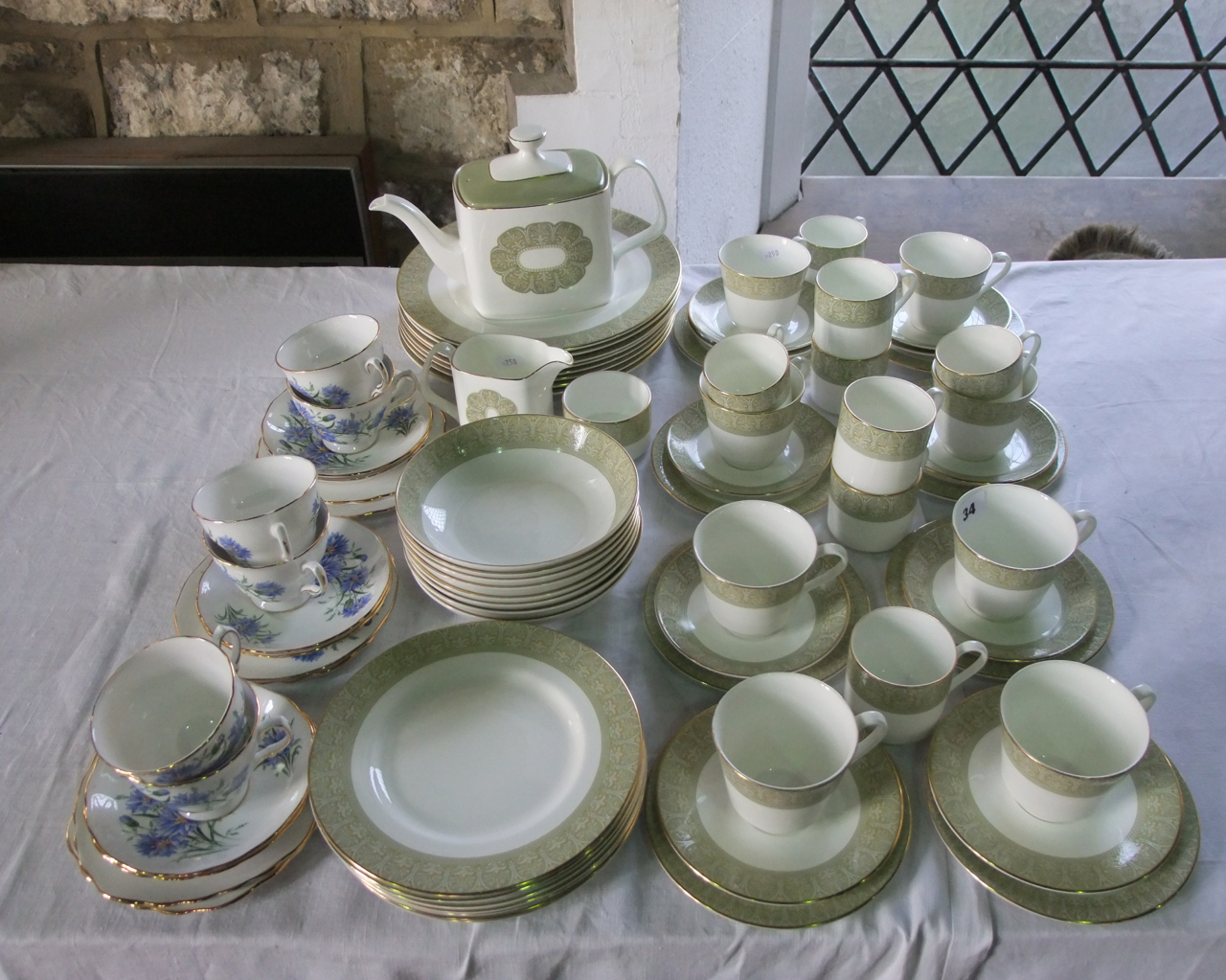 A quantity of Royal Doulton Sonnet pattern dinner and tea wares number H5012 comprising tea pot,