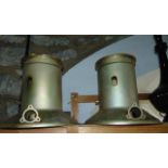 A large pair of unusual industrial metal work elements of cylindrical form, believed to be from