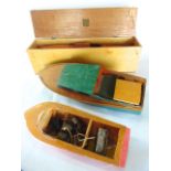 A good quality vintage teak pond launch set within a hinged timber box, 73cm (when boxed) together