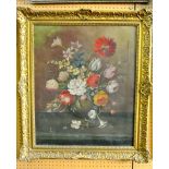 An oil painting on canvas of a floral still life in the 17th century manner signed indistinctly