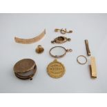 A collection of scrap 9ct items, tie pin, watch case, dress stud, etc, 35 gms of weighable gold