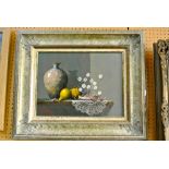 A 20th century oil painting on board by Noel Ripley showing a still life with vase, gourds,