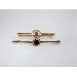 A 9ct gold bar brooch set with a central amethyst and two seed pearls and a further 9ct bar brooch