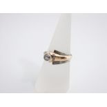 A 14ct gold cocktail ring, the central diamonds with Art Deco style mount, size P