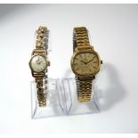 A ladies Omega deville wristwatch and strap with gold plated finish and a further Omega wristwatch