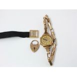 A 9ct gold art deco ladies wrist watch (plated strap), 9ct gold padlock clasp and seed pearl set
