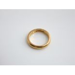 A 22ct gold wedding band, 7.9 gms, size P