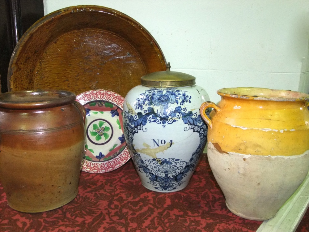 A large early 19th century tin glazed earthenware drugs jar