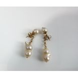 A pair of gold and pearl drop ear-rings