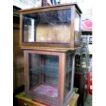 A small vintage, probably 19th century, mahogany wall mounted display cabinet of rectangular form