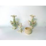 A collection of Belleek wares comprising a pair of vases with encrusted floral decoration height