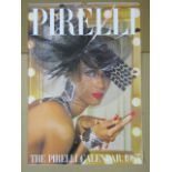 A collection of four Pirelli calendars dating from the 1980s in original cardboard packaging