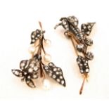 Two Victorian gold/silver and diamond orchid brooches both numerously set with old cut diamonds, one