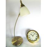 A brass cased marine or bulk head dial clock with quartz movement, further vintage table lamp