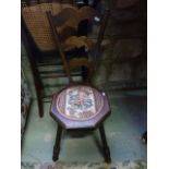An Edwardian folding steamer/garden chair with cane panelled seat, a further small oak stool with
