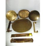 A collection of metal wares to include a large eastern brass tray of circular form, three heavy