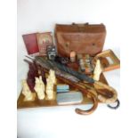 A Royal Beasts chest set complete with board, a vintage leather brief case, a number of umbrellas,
