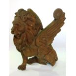 A cast iron model of a classical winged lion