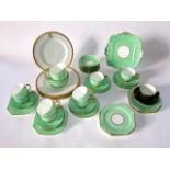 A quantity of Paragon China tea wares with speckled green ground comprising, cake plate, milk jug,