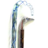 A walking cane, with a hallmarked silver heron head with blue bead eyes together with Nailsea