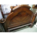 A Victorian gothic revival single bedstead, satinwood veneered, the stepped arched and moulded