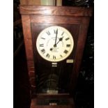 A vintage Gledhill-Brook Time Recorders Ltd clocking in and out clock, serial number 71615