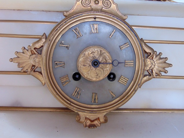 A mid 19th century onyx and gilded brass mantle clock in the classical style, the eight day striking - Image 2 of 4