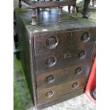 A Victorian counter fitted with four long graduated drawers with dished knob pull handles, of