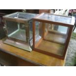A small unusual vintage copper framed table/counter top cabinet of square cut form with glazed