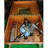 A vintage petrol driven drill by Bridges with three speed mini mota, with chrome casework and