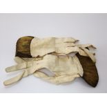 A pair of Georgian kid skin gloves with gilded hand woven cuffs with trailing floral detail, 26 cm