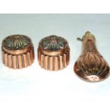 A pair of 19th century copper aspic moulds of circular geometric form, together with a 19th