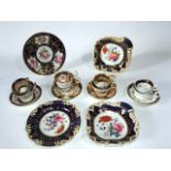 A collection of early 19th century British ceramics, all with finely painted floral bouquets and