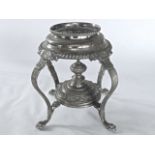 A silver plated table standing oil lamp frame on lions paw feet, further oil lamp including two wall