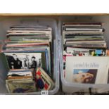 Two boxes of mixed LPS and single records mainly rock and pop but also including some jazz,
