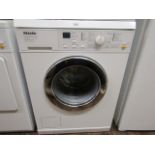 A Miele honeycombe care automatic washing machine model number 3204