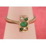 An 18ct gold emerald and diamond plaque ring, 2g approx ring size M