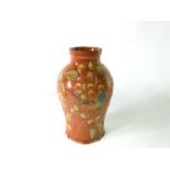 A large early 20th century Lauder West Country pottery vase with relief moulded fruiting bough and