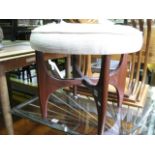 A G Plan fresco teak dressing stool with circular upholstered and central buttoned seat raised on