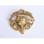 A Victorian unmarked yellow metal and diamond fox brooch, 13g approx